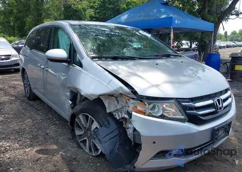 2014 Honda Odyssey Touring/Touring Elite z USA, uszkodzony, nr VIN 5FNRL5H97EB054158